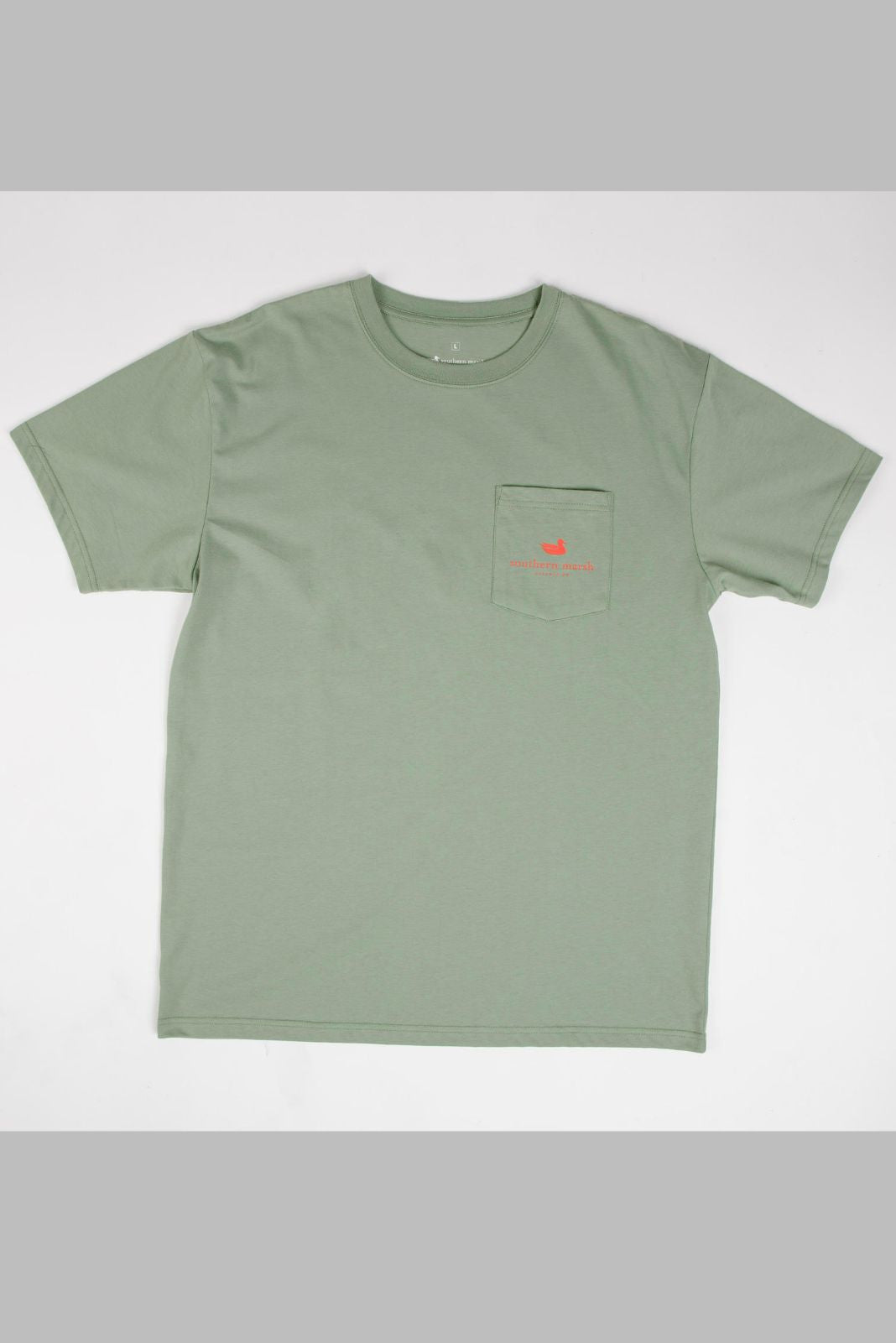 The Southern Marsh Outfitter Collection pays homage to the great outdoors with the Redfish -- one of the most popular sport fish in the United States. They are commonly known by several names: Red Drum, Channel Bass, Spot-Tail Bass or colloquially in the marshlands, simply as Reds. The Redfish’s most distinguishing mark is a large, coin-sized, black spot on the upper part of the tail’s base. The black spot near their tail helps fool predators into attacking the red drum's tail instead of their head, allowin